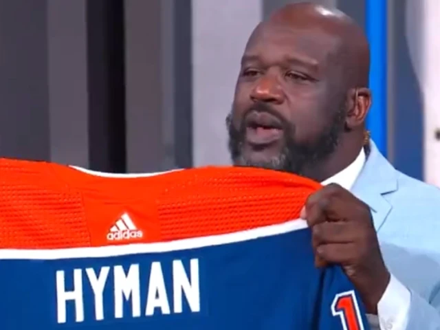 Oilers send Shaq personalized Hyman jersey and seven-foot-hockey stick