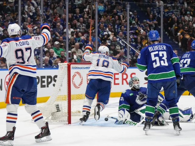 Bouchard lifts Oilers to overtime win over Canucks in Game 2