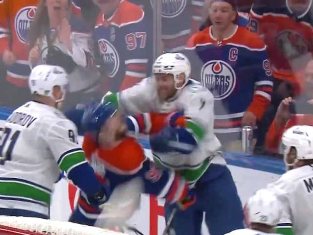 McDavid takes cross-check to the face at end of Canucks-Oilers game