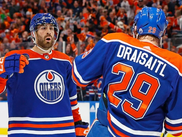 Oilers fight off Canucks' comeback bid in massive Game 4 win