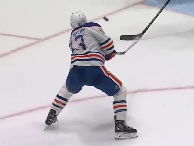 Nugent-Hopkins fires puck in off Silovs for power-play goal