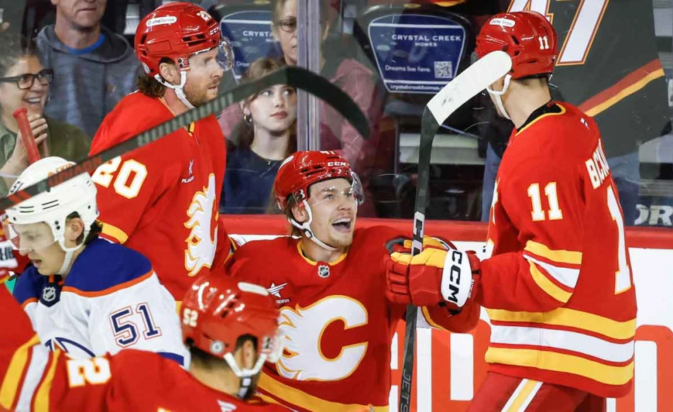 Flames score four in second period to burn Oilers in split-squad game in Calgary