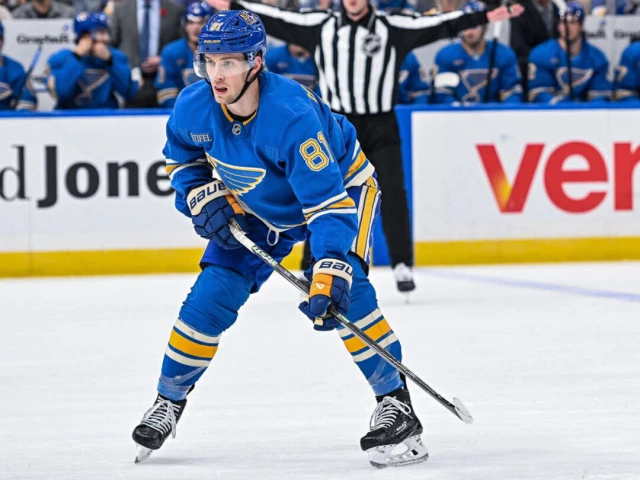 Blues' Holloway in stable condition after being hit in throat by puck