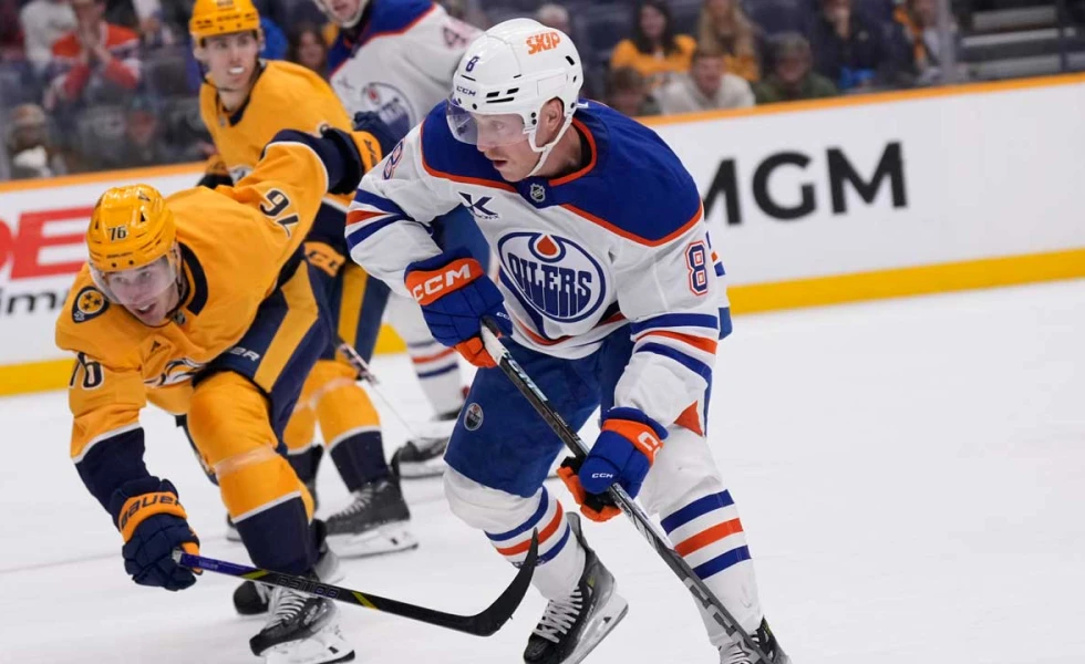 Oilers recall forward Drake Caggiula from AHL