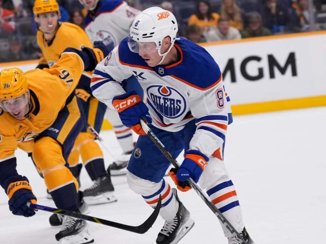 Oilers recall forward Drake Caggiula from AHL