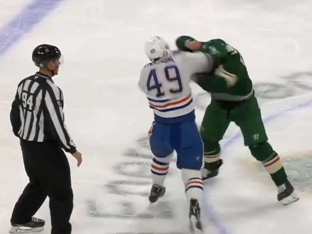 Oilers’ Emberson goes toe-to-toe with Wild’s Lauko at centre ice