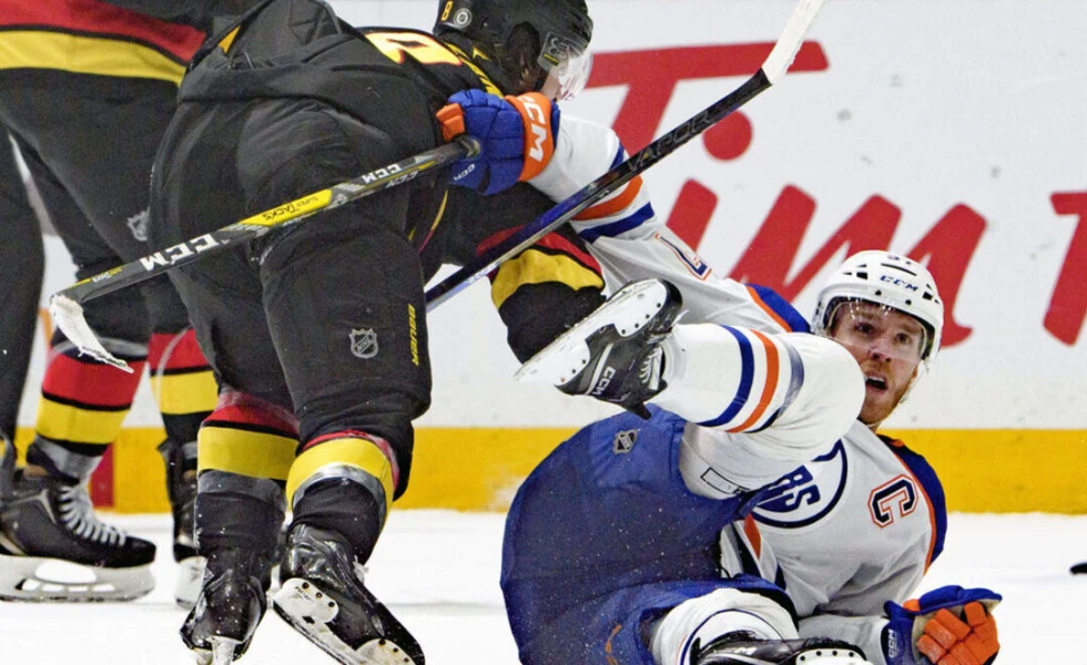 McDavid handed match penalty after late scuffle in loss to Canucks