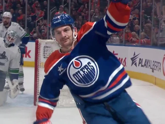 Hyman tucks home goal thanks to long-range pass from Draisaitl