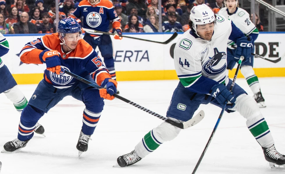 Canucks’ Sherwood exits early against Oilers