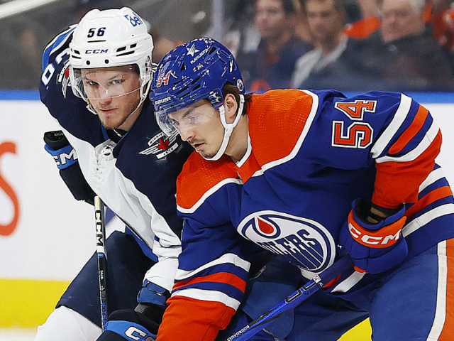 Oilers debut a new sponsor on their home helmets