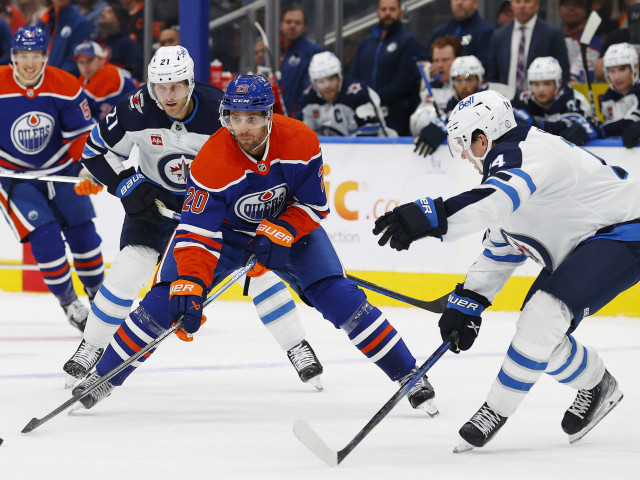 What is the solution to the hole at fourth-line center for the Oilers?