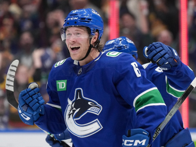 Boeser has first career four-goal night as Canucks rout Oilers in season opener