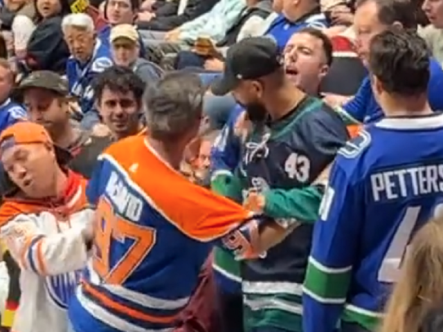 Oilers fan brawls with Canucks fans at season opener