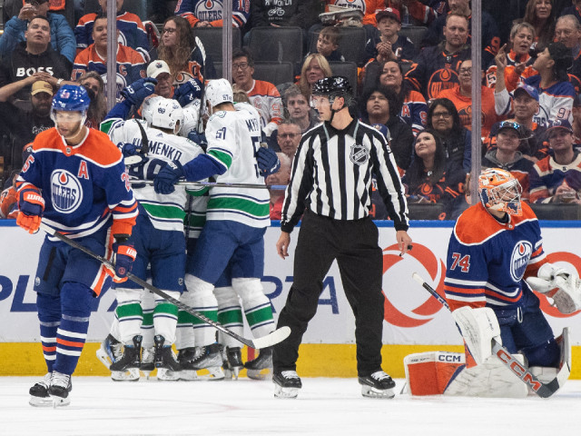 Canucks badly outshot, but still hold off Oilers to start season 2-0