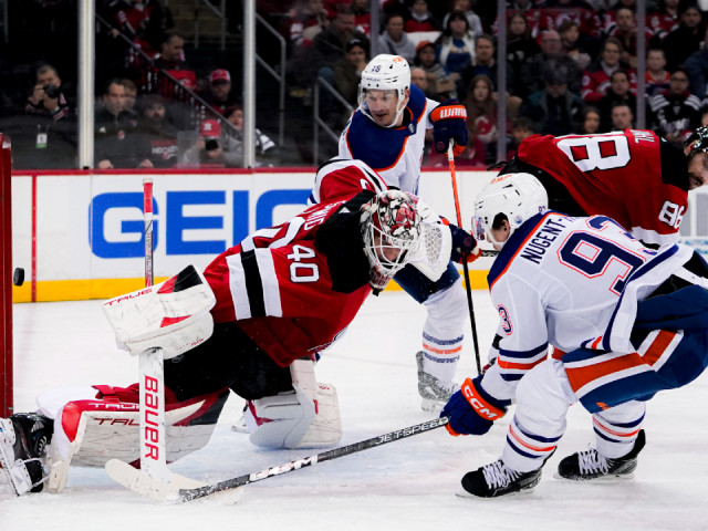 Oilers get big goals from McDavid and Draisaitl, net four in third to beat Devils