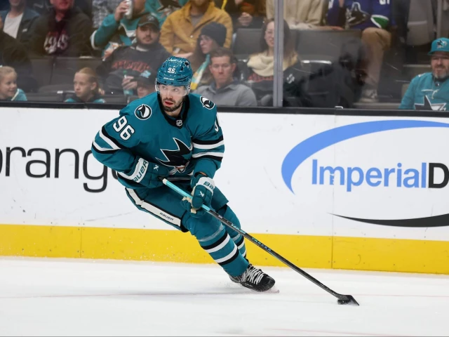 Sharks trade defenseman Jake Walman to Oilers for first-round pick