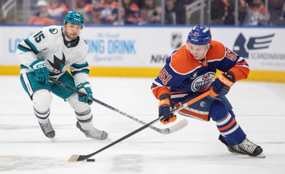 Oilers clinch playoff spot, but lose two key players