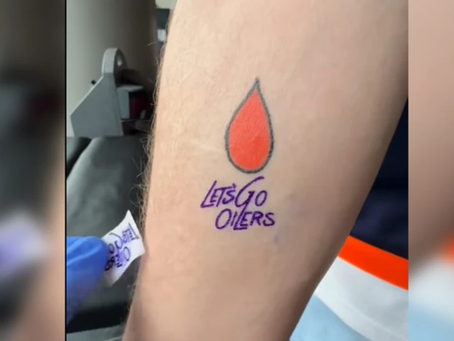 Fans are lining up to get free Edmonton Oilers tattoos and they're permanent