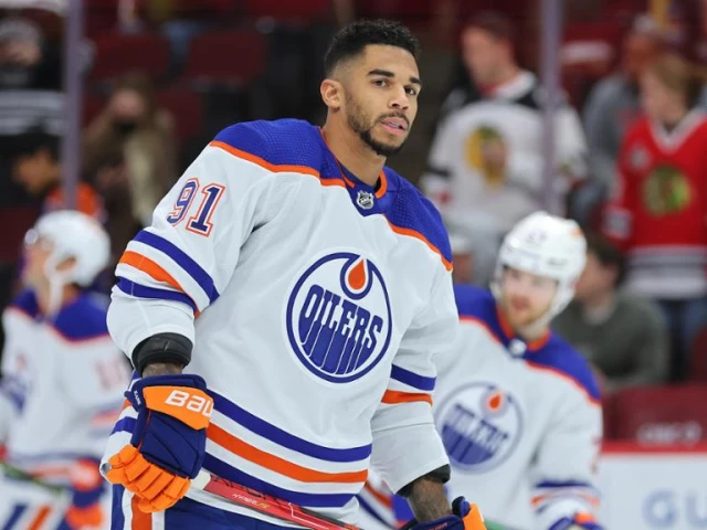 Kane traded to the Canucks