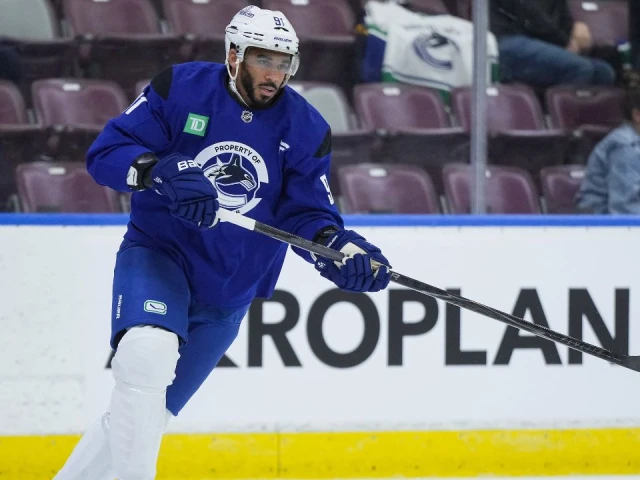 Evander Kane scores empty-netter in winning pre-season debut with Canucks