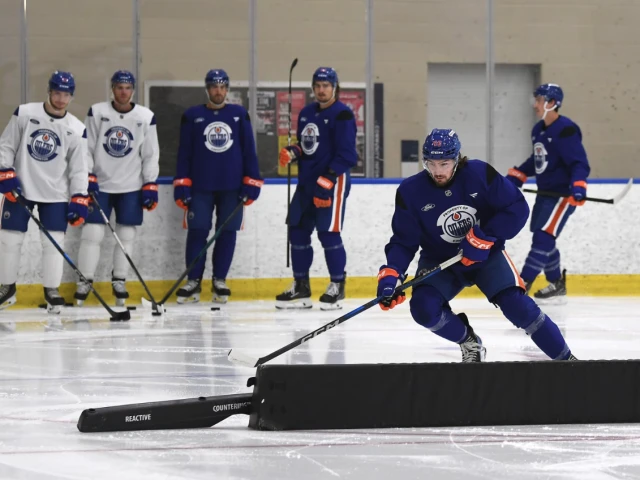 Who do the Edmonton Oilers still have at training camp?