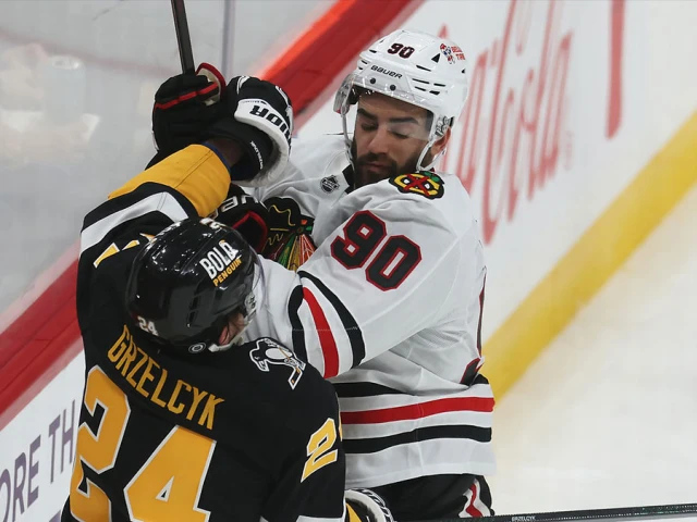 Blackhawks sign defenseman to one-year deal