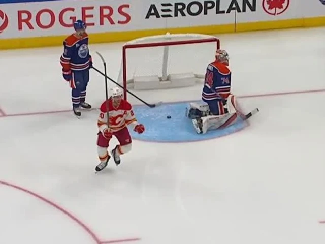 Flames’ Coleman pots game-tying goal off Oilers’ miscommunication