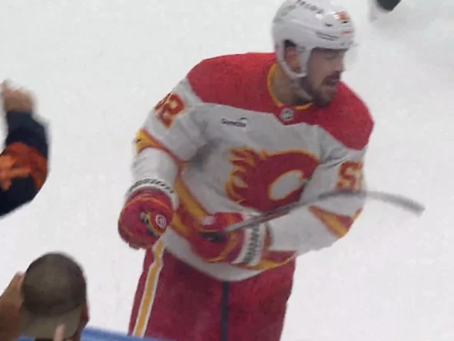 Flames’ Weegar irate, slams stick on glass after penalty called in OT