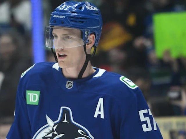 NHL fines Canucks defenceman Myers for slashing McDavid