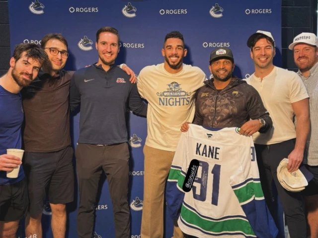 Pair of Vancouver Canucks players cozy up to FBI Director Kash Patel
