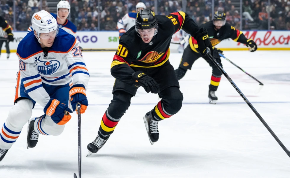 Canucks D Victor Mancini exits early vs. Oilers