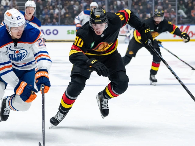 Canucks D Victor Mancini exits early vs. Oilers