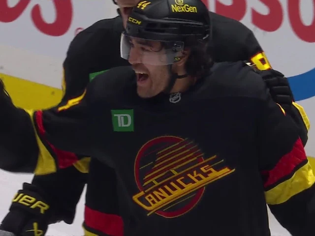 Canucks’ Sherwood tips home Boeser shot for OT winner vs. Oilers