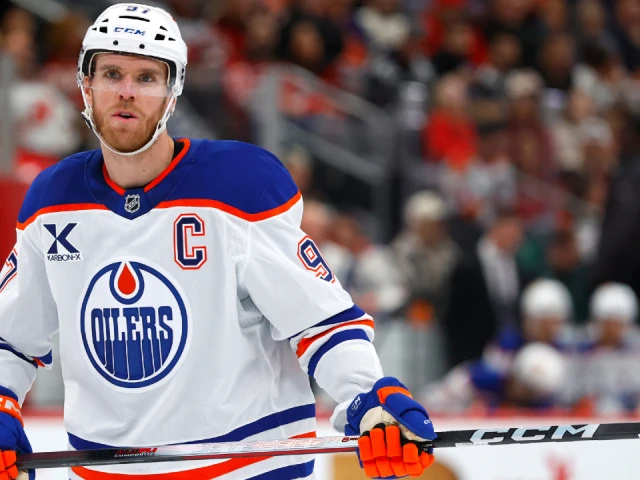 Oilers’ McDavid tees up Roslovic for his 1,100th career point