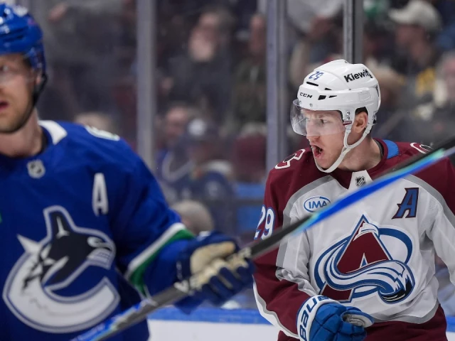 MacKinnon nets five points as Avalanche beat Canucks in overtime
