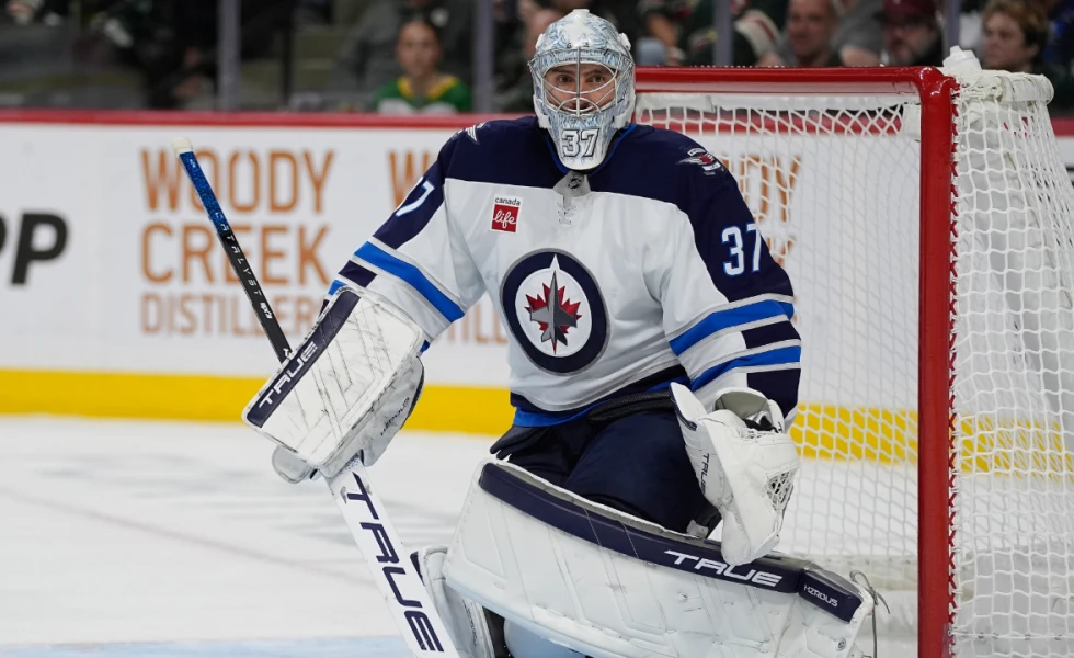 Jets’ Connor Hellebuyck on ice for first time since knee surgery