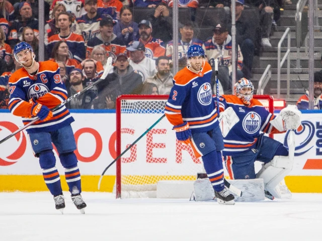 Warts return as Oilers salvage point vs. Sabres