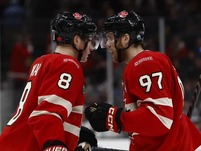 Who will play with Connor McDavid at the Olympics?