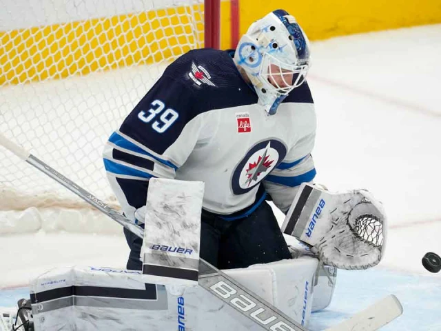 Blackhawks trade goalie Laurent Brossoit to Sharks in four-player deal