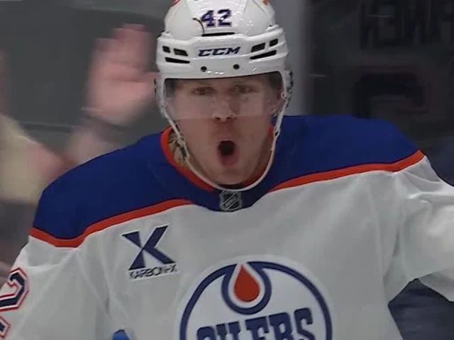 Oilers stun Canucks by scoring six second period goals