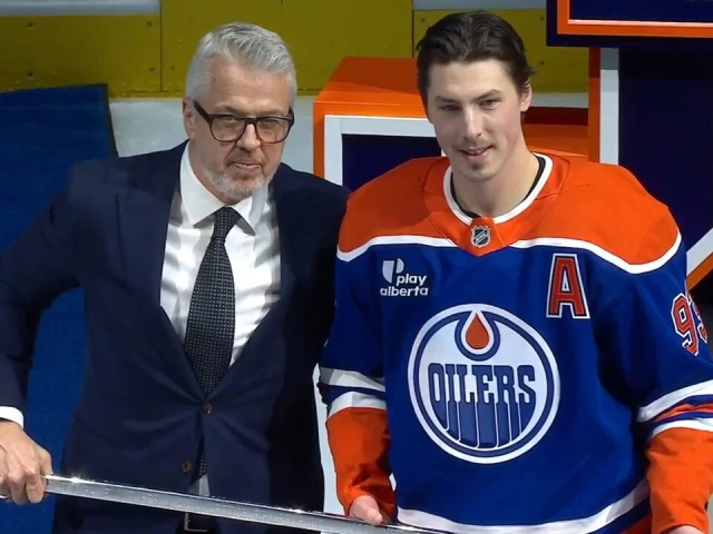 Nugent-Hopkins receives silver stick to commemorate 1,000 games with Oilers