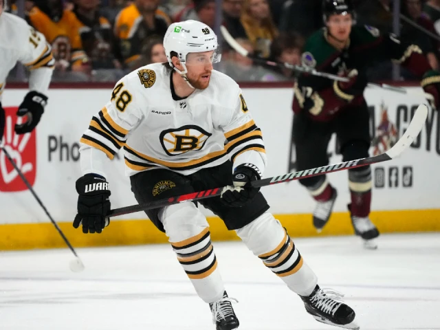 Bruins’ Grzelcyk exits game vs. Oilers with lower-body injury