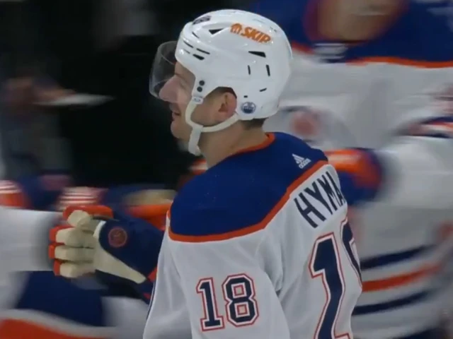 Oilers’ McDavid scores 100th point with slick pass off his skate to Hyman