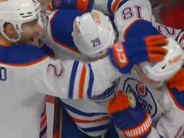 Oilers’ Hyman mobbed by teammates after netting 50th of season