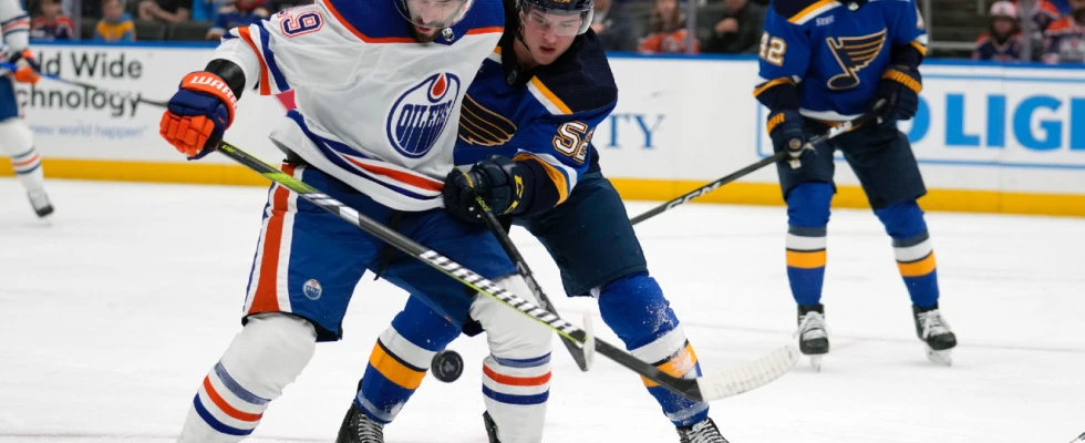 Oilers rally but fall to Blues in overtime