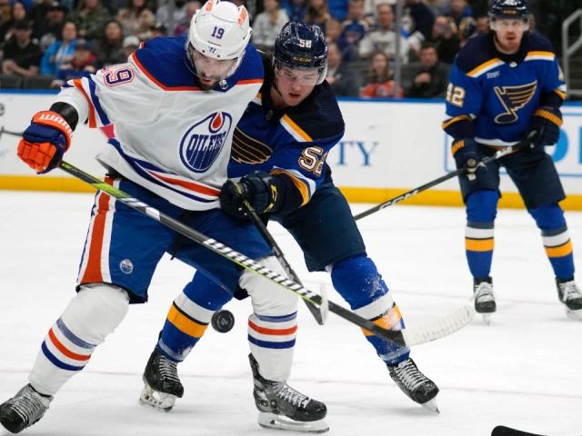 Oilers rally but fall to Blues in overtime