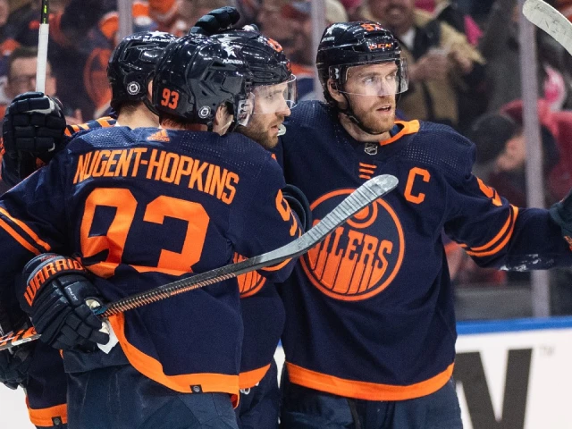 Oilers clinch playoff berth with win over Avalanche