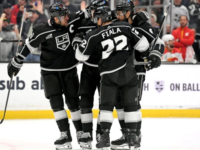 Kings clinch playoff berth with win over Flames