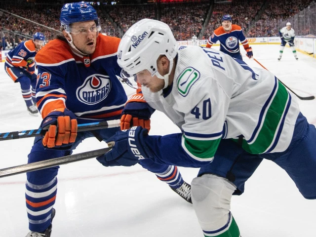 Canucks beat Oilers, close in on Pacific crown